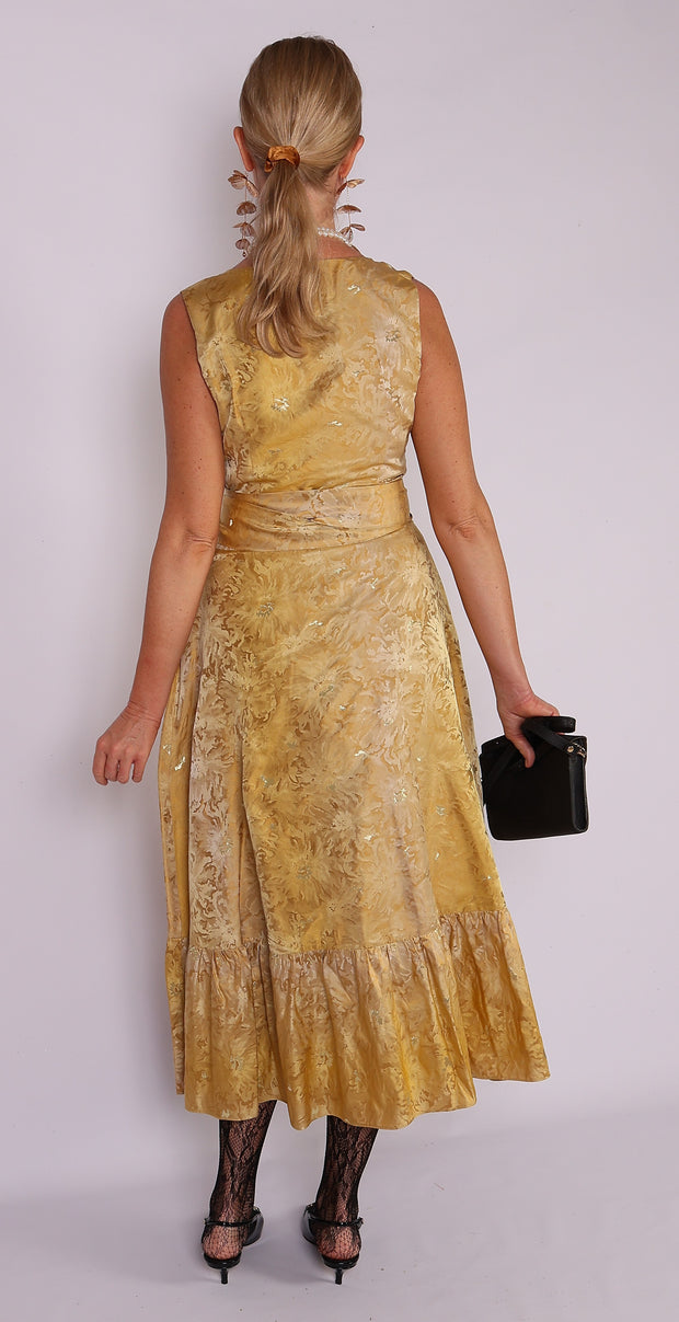 Lady in Gold silk dress