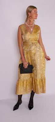 Lady in Gold silk dress